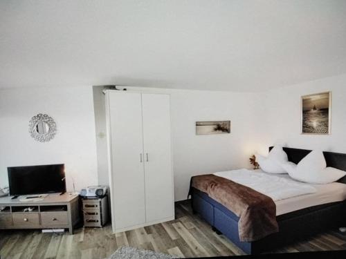 Giường trong phòng chung tại Holiday home with 1 bedroom