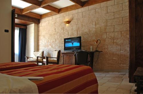 UNA HOTELS Regina Bariにあるベッド