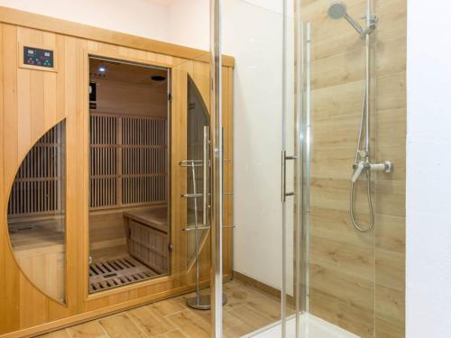 a shower stall with a glass door in a bathroom at Villa Branka - Villa Tomi Drni - Siveri in Siverić