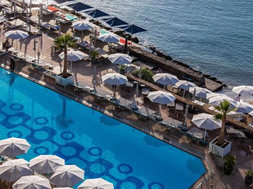 Πισίνα στο ή κοντά στο Pullman Cannes Mandelieu