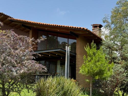 Κήπος έξω από το Cabañas Santa Fe Tapalpa
