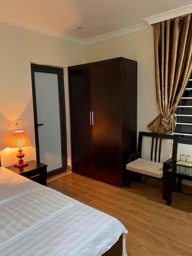 Katil atau katil-katil dalam bilik di Hà Tiên Motel