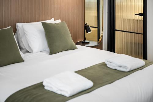 Кровать или кровати в номере Innova Motel Warrnambool