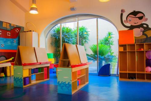 a play room with many different toys in it at Grand Fiesta Americana Los Cabos All Inclusive Golf & Spa in Cabo San Lucas