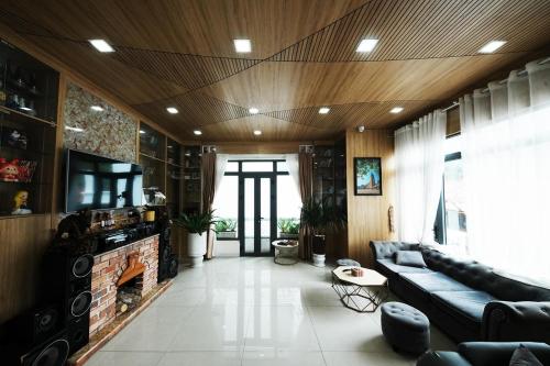 Et opholdsområde på Vô Tư Luxury Hotel