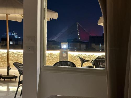 Zdjęcie z galerii obiektu sun 3 pyramids view inn w Kairze