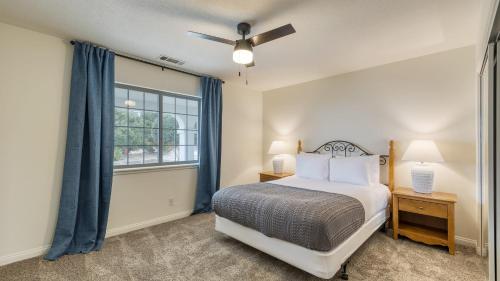 a bedroom with a bed and a window at Le Grand Bleu by AvantStay Luxury Hilltop Estate in Temecula