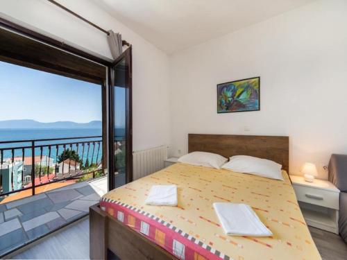 Ένα ή περισσότερα κρεβάτια σε δωμάτιο στο One Bedroom Apartment With Balcony A3