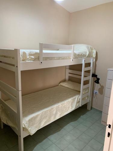 Postel nebo postele na pokoji v ubytování Agosto 23 Centrico