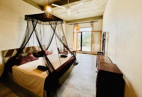Voodi või voodid majutusasutuse The Traveller Kandy toas