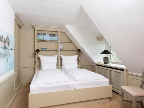 Ένα ή περισσότερα κρεβάτια σε δωμάτιο στο Bettinenhof-West