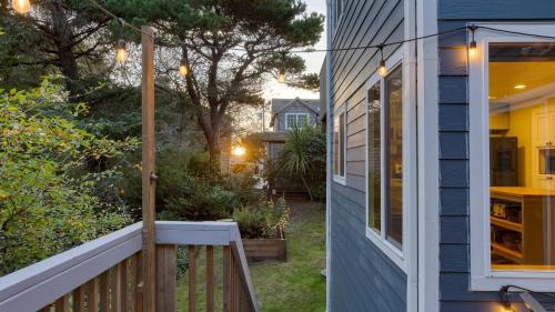 a view from the porch of a house at Royal Canoe by AvantStay Walk to the Shore Private Yard in Arch Cape