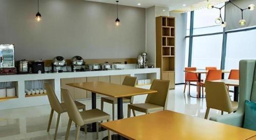 Area soggiorno di City Comfort Inn Liupanshui Sports Center