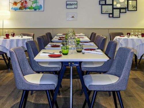 Un restaurante u otro lugar para comer en Mercure Hotel Forbach Centre de Loisirs