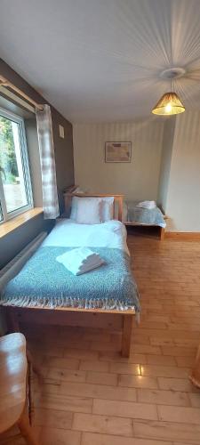 Кровать или кровати в номере Lackandarralodge large 5BR entire house sleeps14!