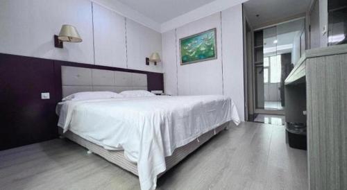 Postel nebo postele na pokoji v ubytování Bashan Hotel
