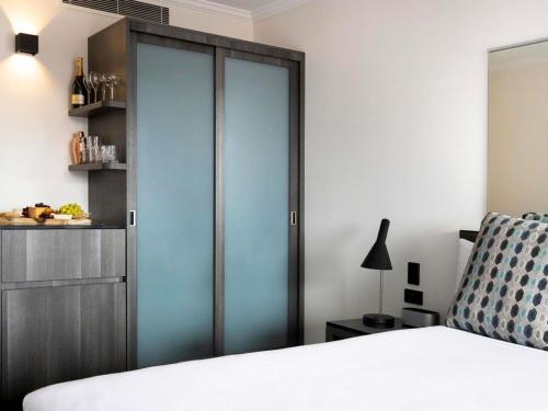 Voodi või voodid majutusasutuse Mercure Sydney toas