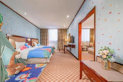 Cama o camas de una habitación en Nanning Yongjiang Hotel