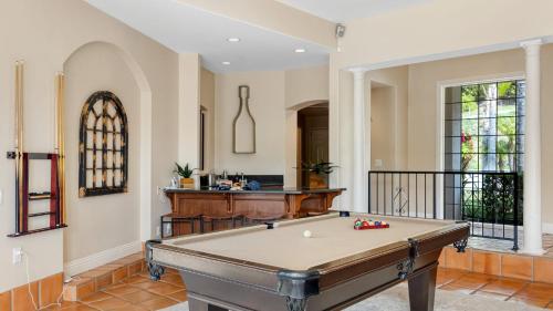 a large room with a pool table in it at Grapevine by AvantStay Secluded 5BR Villa 4 Acres of Vineyards Avo Groves in Temecula