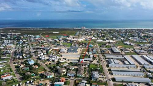 an aerial view of a city with the ocean at Pool Walk to Old Town Eateries Nightlife Shopping Rock N Reelby AvantStay in Port Aransas
