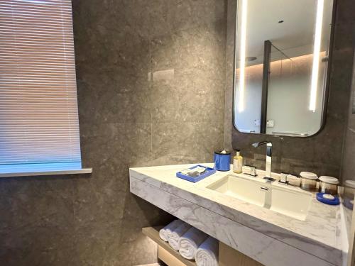 Un baño de 上海虹桥冠华酒店 - 北新泾地铁站