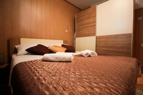 Llit o llits en una habitació de Apartment Gabrijela