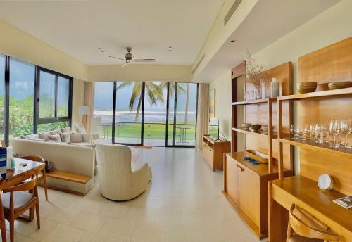 a living room with a view of the ocean at Villa seaview and apartment -Spa Da Nang Resort by JT group "Free pick up" in Da Nang