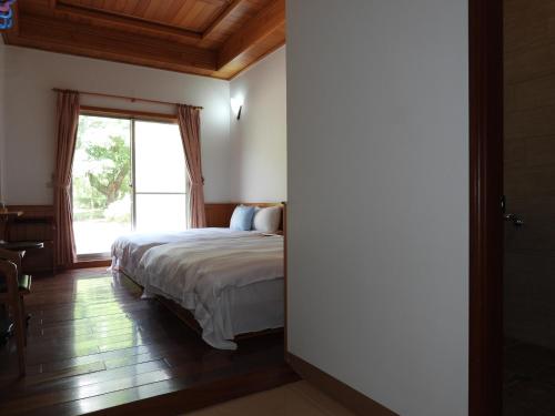 Katil atau katil-katil dalam bilik di Seasons Inn