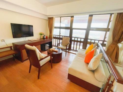 TV a/nebo společenská místnost v ubytování Man Wan Harmona Resort