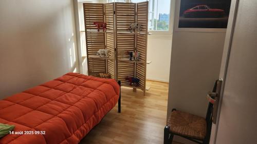 Ένα ή περισσότερα κρεβάτια σε δωμάτιο στο Chambre 1 Personne