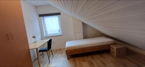 Postel nebo postele na pokoji v ubytování Volli Monteurzimmer Schwäbisch Hall 6 bis 8 Schlafzimmer bis 11 Pers