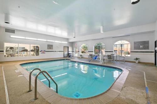 a large swimming pool in a large building at Country Inn & Suites by Radisson, Merrillville, IN in Merrillville