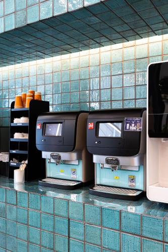 two machines sitting on a counter in a store at Prince Smart Inn Nagoya Sakae in Nagoya