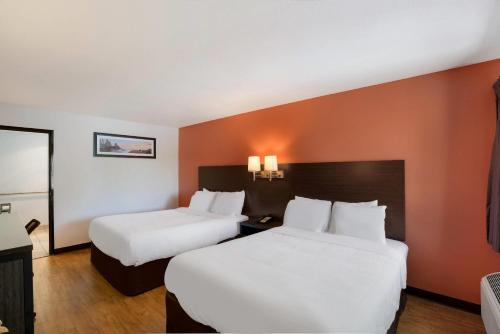 Postel nebo postele na pokoji v ubytování Quality Inn & Suites Junction