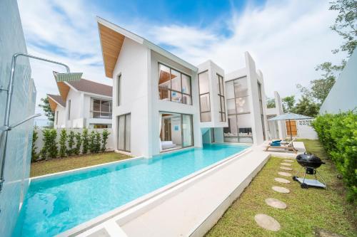 an image of a house with a swimming pool at 4BR Private Pool Villa near Laguna & Beach - Lux Pride 2 by Warm Plus in Ban Pak Lak