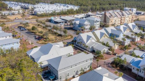 an aerial view of a small town with houses at Coconut Cove by AvantStay Deck w Hot Tub Access to 2 Pools in Santa Rosa Beach