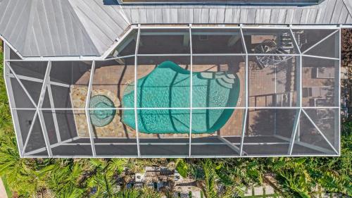 Gambar di galeri bagi Walk to Beach PoolHot Tub Game Room Captiva 5BDR Coco Mango by AvantStay di Captiva
