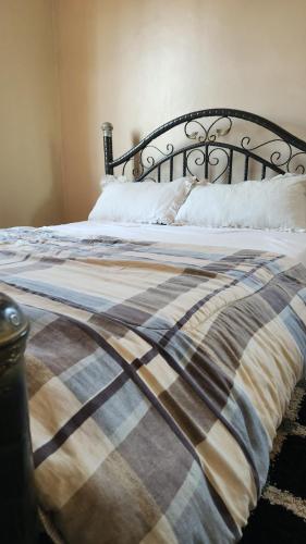 Ένα ή περισσότερα κρεβάτια σε δωμάτιο στο MD comfort living