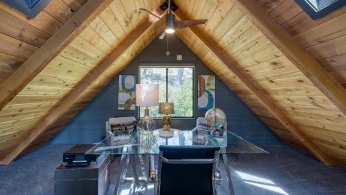 a dining room with a glass table and a ceiling at Kenwood Vista by AvantStay 7acres w Pool Fire Pit Vineyard Views in Kenwood
