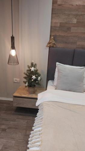 Cama o camas de una habitación en Apartman Viva Milmari