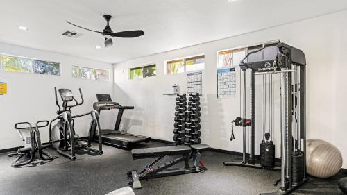 a gym with several exercise equipment in a room at Walk to Beach Pool Hot Tub Private Patio Parking Seabreeze Retreat in Dana Point