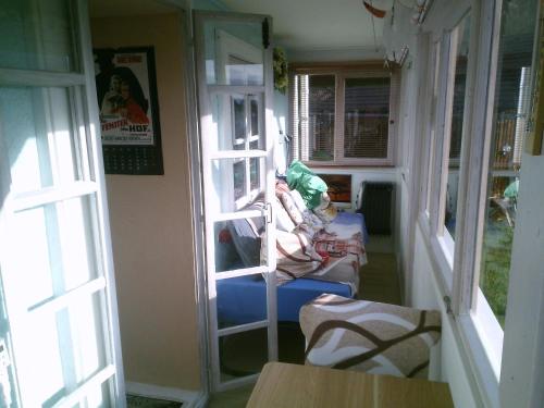 Ruang duduk di Beautiful apartment in a Black Forest house with conservatory