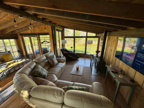 Posezení v ubytování Weston Log Cabin