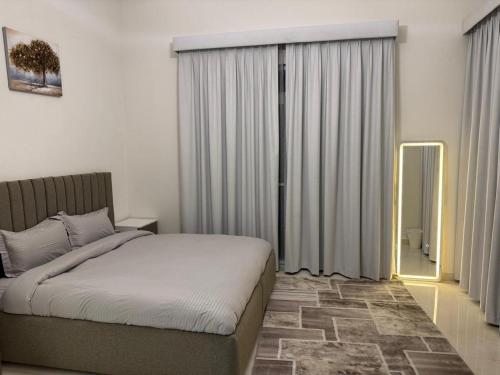 En eller flere senge i et værelse på استراحة جبال مصفوت