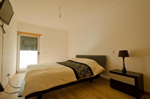 Un ou plusieurs lits dans un hébergement de l'établissement Modern 2 Bed Apartment 5km Carvoeiro
