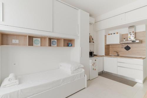 GuestHost - Bright Studio Apartment Bocconi Milano