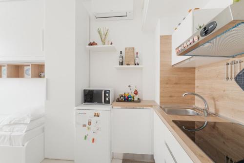 GuestHost - Bright Studio Apartment Bocconi Milano