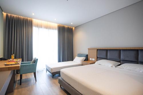 Katil atau katil-katil dalam bilik di AMR Hotel - Durres