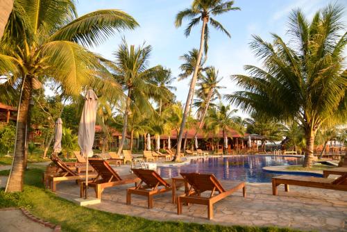 Bazén v ubytování Mango Beach Resort nebo v jeho okolí