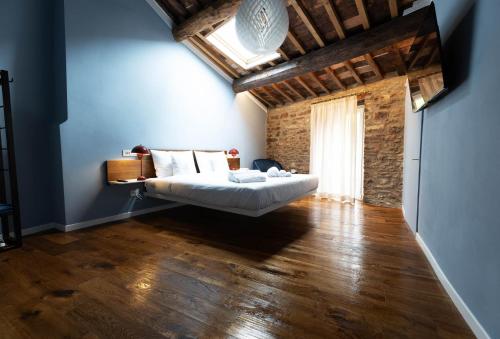 Ένα ή περισσότερα κρεβάτια σε δωμάτιο στο Casa Suntina